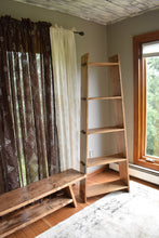 A frame ladder shelf with matching Bench